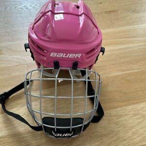 Youth pink Bauer hockey helmet ! Only used once !